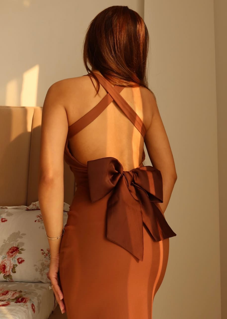 Amora Bow Bodycon, open back with crossed straps and oversized bow